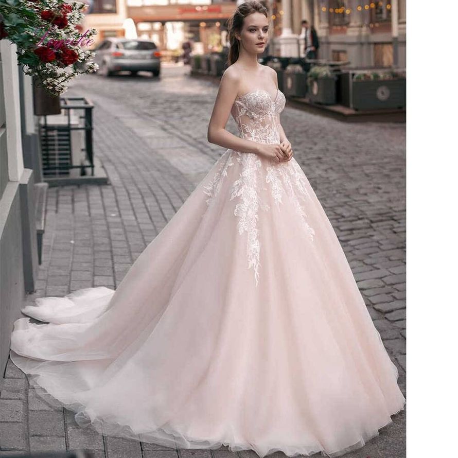 Пышное свадебное платье в пудровом цвете