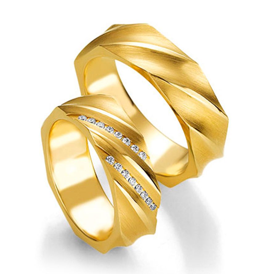 Обручальные кольца из желтого золота с бриллиантами на заказ