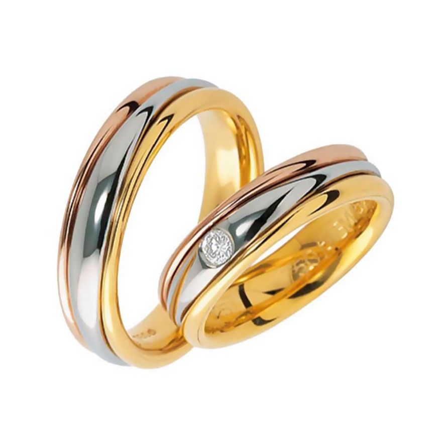 Обручальные кольца из комбинированного золота с бриллиантом на заказ