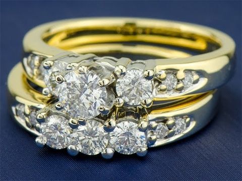 Двойное золотое кольцо с бриллиантами 0.90 карат